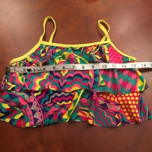 Girl’s swimwear vibrant colored tiered top.